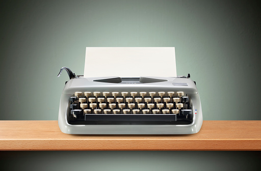 Vintage typewriter on the desk.