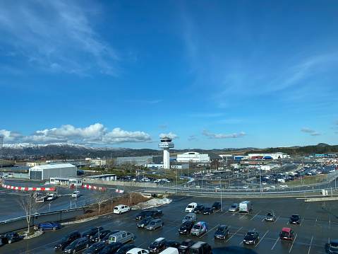 General views of the Airport and terminal buildings of Bergen in Norway on a winter day with blue sky