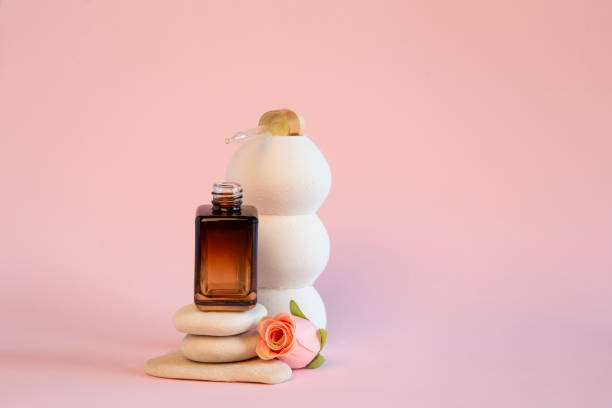 istock White vase with white stones and serum for face 1479636498