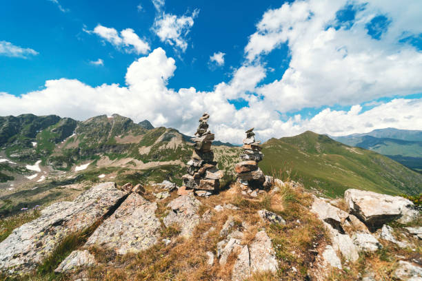 Stone pyramid at the top of a mountains