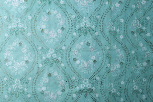 istock Old wallpaper on the wall. Old wallpaper for texture or background. 1479639204