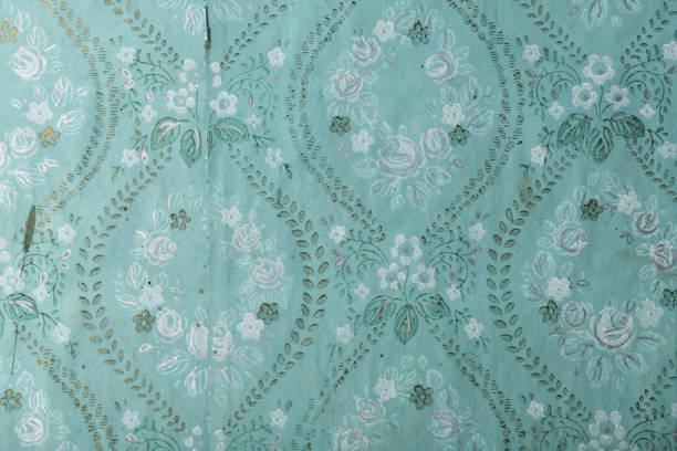 istock Old wallpaper on the wall. Old wallpaper for texture or background. 1479639228