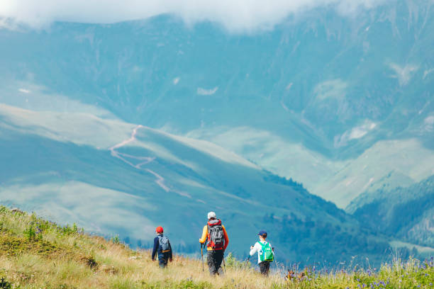 istock Father trekking with sons in mountains 1479641467