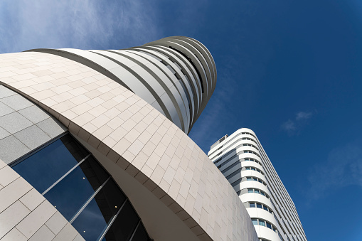 Modern hotel building against blue sky in the district of Parque das Nações in Lisbon, Portugal