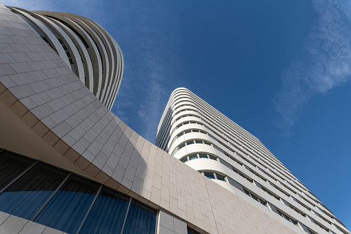 Modern hotel building against blue sky in the district of Parque das Nações in Lisbon, Portugal