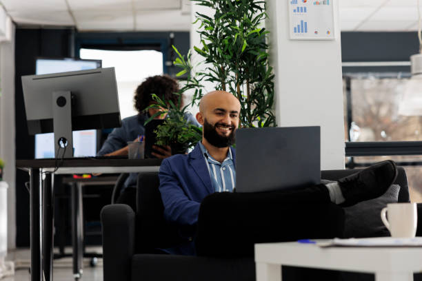 istock Smiling arabian businessman having videoconference with coworker 1479646861