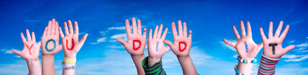 istock Children Hands Building Word You Did It, Blue Sky 1479646898
