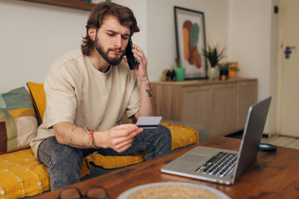 istock A bank client notices a problem and is worried about a credit card problem, the threat of financial fraud 1479648253