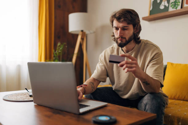istock Bearded man having problem with credit card, loss money, internet fraud and scam concept 1479648547