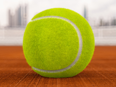Tennis Ball on Clay Court. 3D Render