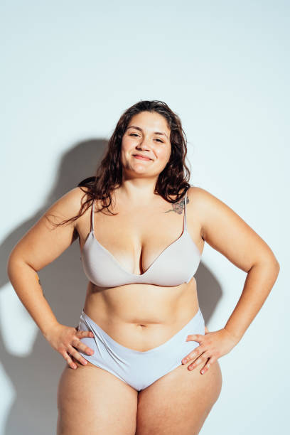 istock Plus size woman posing in studio in lingerie 1479650615