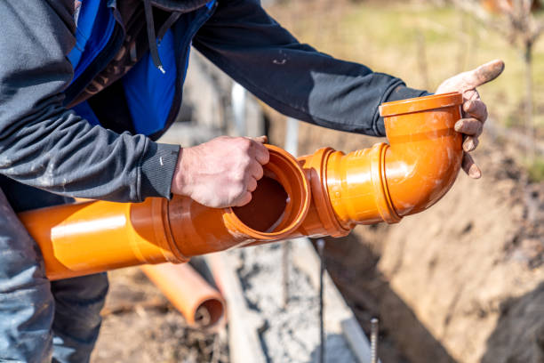 orange PVC plastic pipes on the construction site