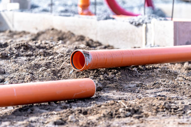 istock orange PVC plastic pipes on the construction site 1479653631