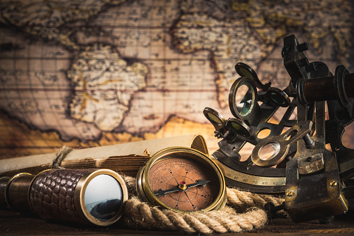 Antique navigation equipment, compass and telescope