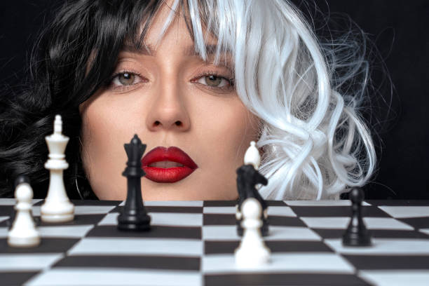 istock Beautiful woman with chess portrait 1479668612
