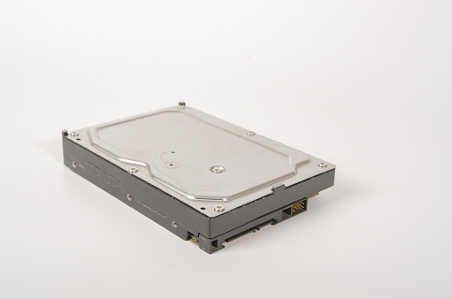 Close up of a hard drive from a computer. white background image