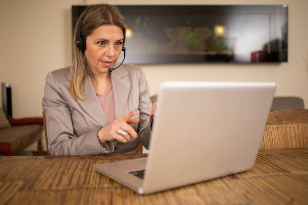 istock Mature woman working from home 1479669760