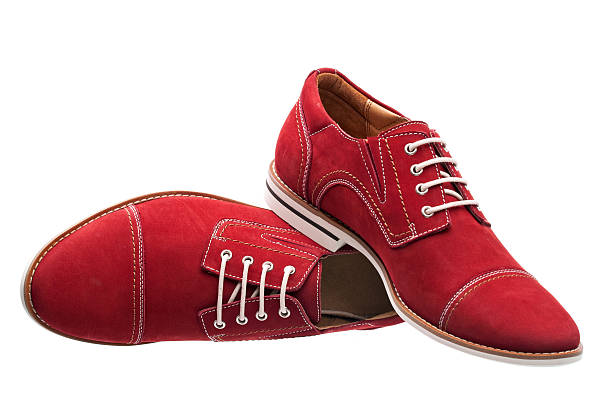 istock Red men laced shoes isolated over white 147967041