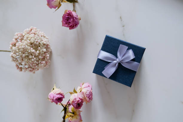 istock romantic surprise and love present concept on marble texture background 1479670640