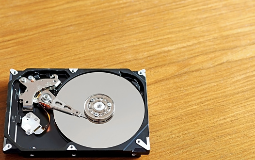 A hard drive of a computer on a table