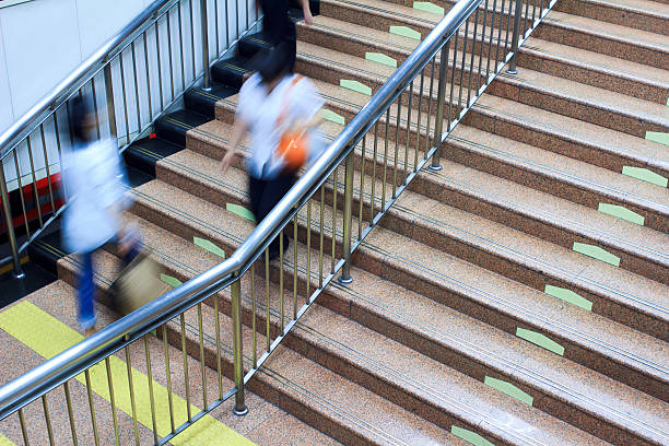 istock People on the stairs 147967260