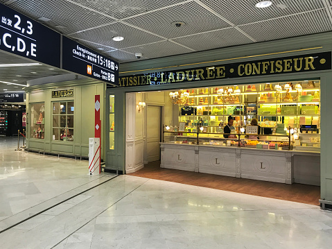 Ladurée at Orly airport in Paris. Ladurée is a famous luxury bakery and confectionery brand known for its macarons and other pastries, founded in 1862 in Paris and has since expanded to multiple locations worldwide.