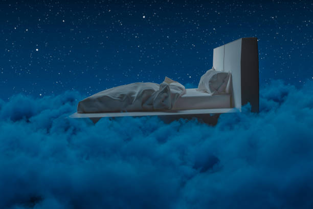 istock 3D rendering of cozy bed over fluffy clouds at night 1479679987