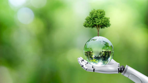 istock Earth crystal glass globe ball and tree in robot hand saving the environment, save a clean planet, ecology concept. technology science of environment concept for the development of sustainability. 1479681736
