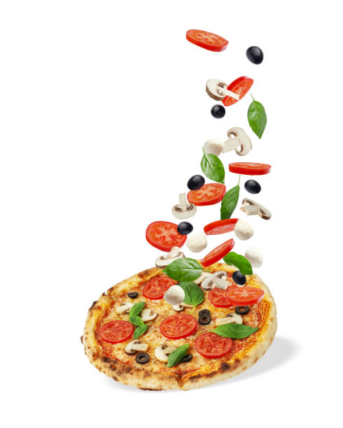 istock Pizza with mushrooms, tomatoes, cheese and basil on a white background. Falling ingredients. Levitation 1479687212
