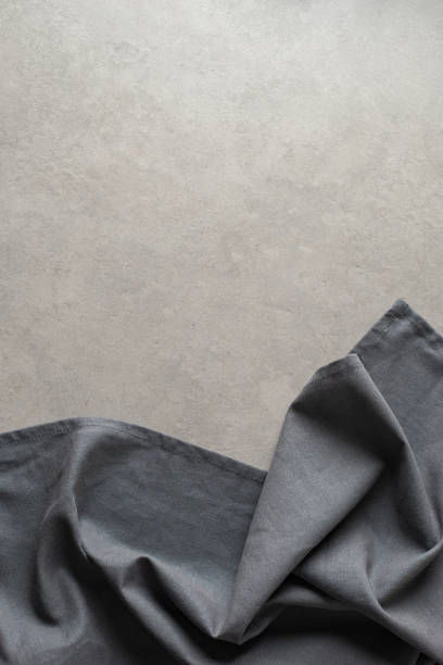 istock gray linen apron on a gray concrete background 1479687814