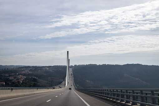 Transmontana A4 motorway, landscape and view of the bridge over the Corgo river, Vila Real, Portugal. Horizontal view.