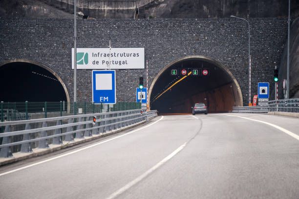 Tunnel entrance. Tunel do Marão is a road tunnel located in Portugal that connects Amarante to Vila Real, crossing the Serra do Marão. Tunnel entrance. Tunel do Marão is a road tunnel located in Portugal that connects Amarante to Vila Real, crossing the Serra do Marão. pavement ends sign stock pictures, royalty-free photos & images