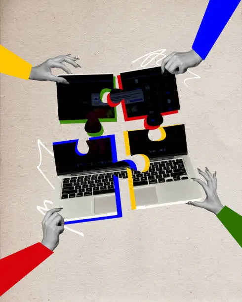 Photo of Human hands connecting puzzles made from laptops. Team work in IT department. Writing programmes and websites. Contemporary art collage. Creative design