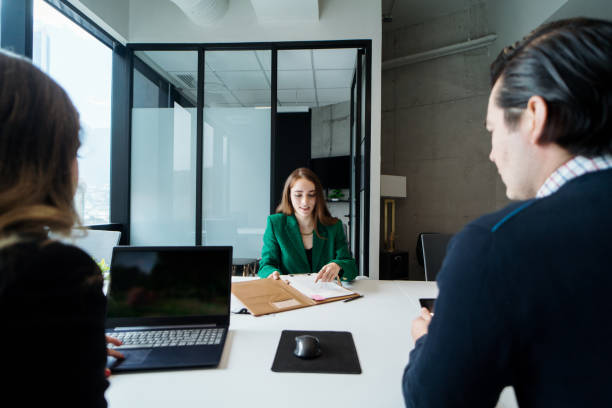istock Financial advisor working with young couple 1479691811
