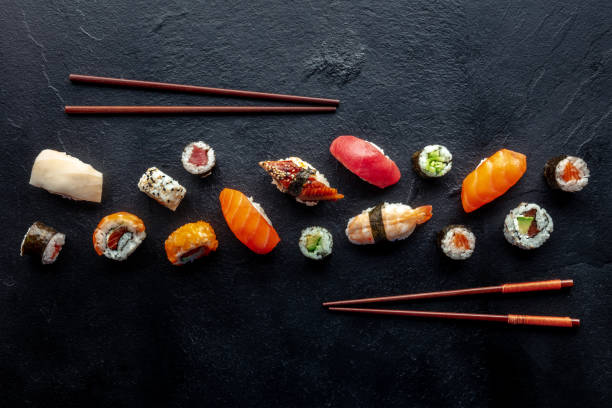 istock Sushi overhead flat lay shot with chopsticks. Rolls, maki, nigiri etc 1479691861