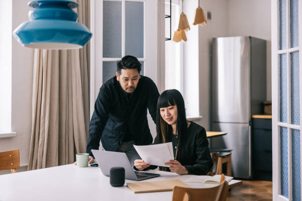 istock Couple working together on their financial bill 1479692506