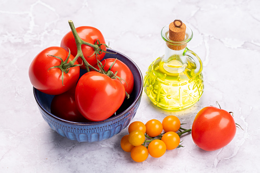 Fresh garden vegetables. Tomatoes and olive oil. Italian cuisine