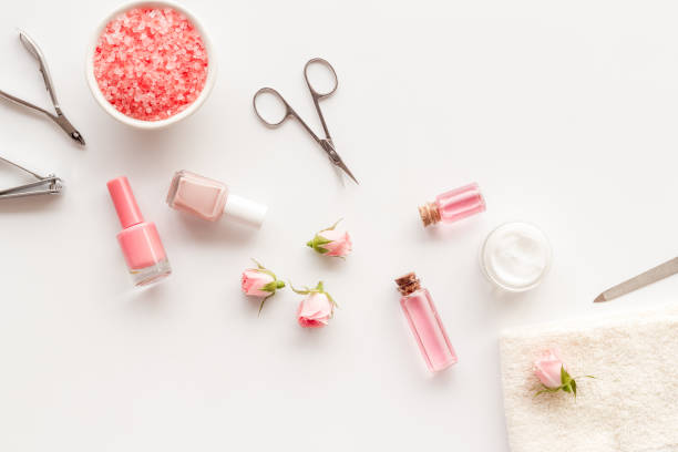 istock Hands and nails care set with manicure tools and roses flowers. 1479694156