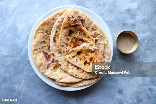 Puran Poli Is An Indian Sweet Flatbread Stuffed With Chana Dal Jaggery Ghee And Cardamom And Is Usually Eaten At Holi Or Gudi Padva Festival Recipe Ingredients Copy Space Healthy Sweet Dessert Stock Photo - Download Image Now