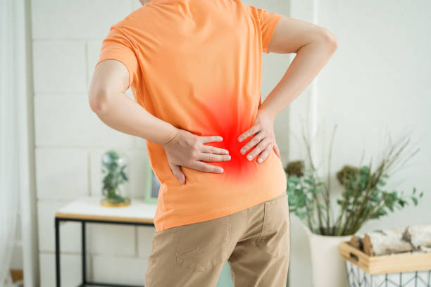 istock Back pain, kidney inflammation, man suffering from backache at home 1479696601