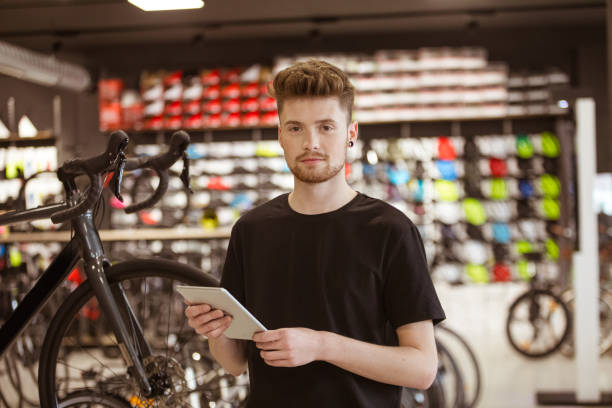 Salesman in bicycle shop