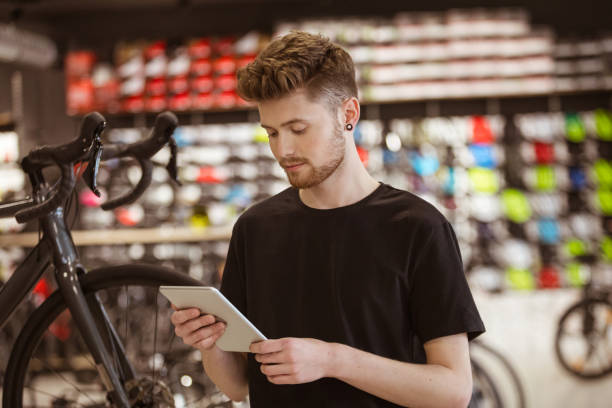 istock Salesman in bicycle shop 1479697081