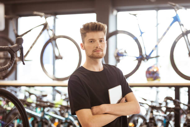 istock Salesman in bicycle shop 1479697134