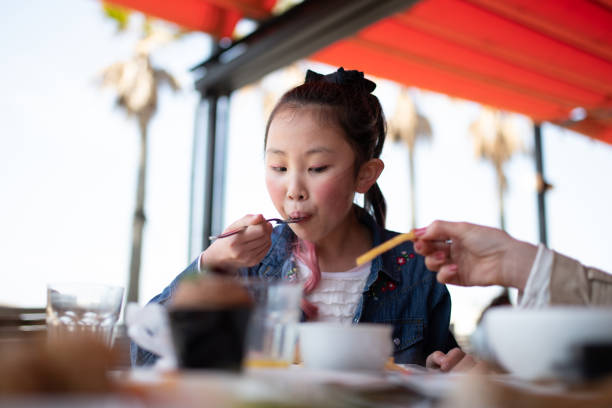 girl eating at a restaurant