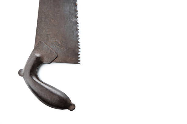 istock Saw for wood. Tools over wood panel. Collection of ancient instruments. 1479701076