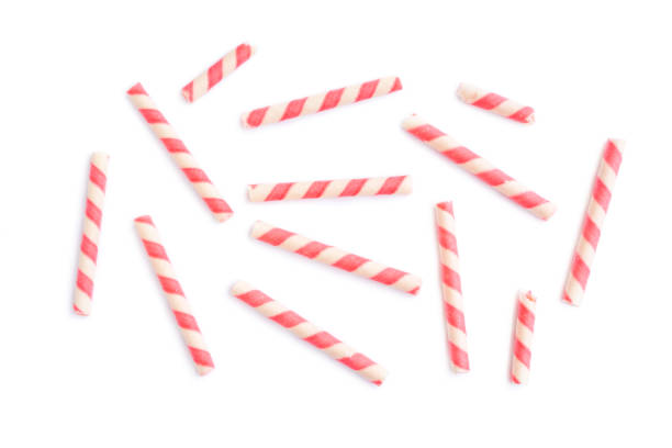 istock Pink striped wafer stick rolls isolated on white background, Strawberry flavour 1479701310