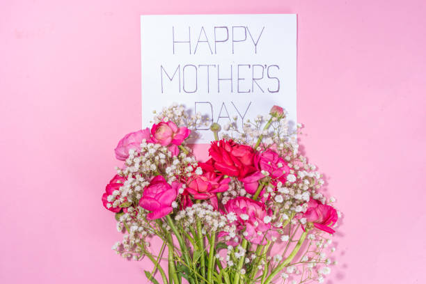 istock Mothers day gift and flowers background 1479708493
