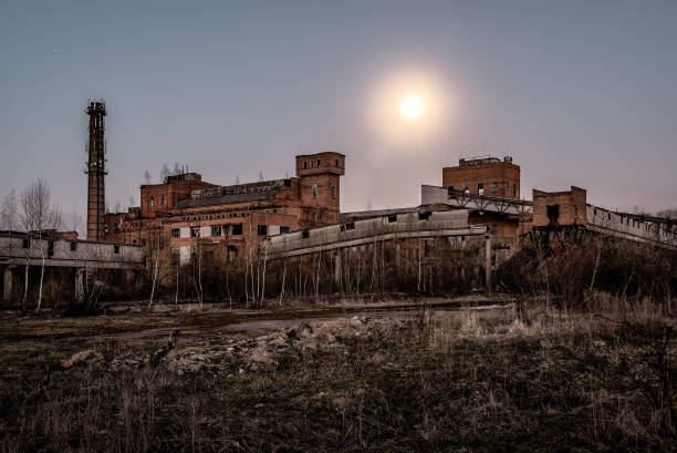istock Old factory ruins under moonlight 1479719548