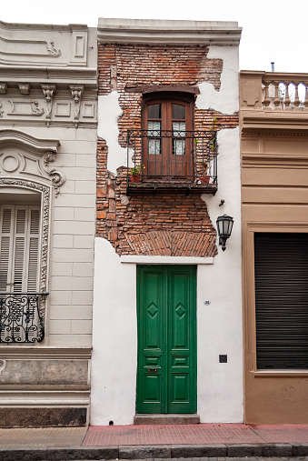Buenos Aires, Argentina / November 2018: Casa Minima, located in the iconic neighborhood of San Telmo in Buenos Aires, is the narrowest house in the city