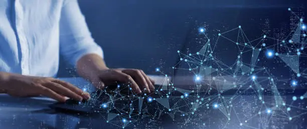 Photo of IT engineer coding on a modern computer with the help of artificial intelligence (AI). Big Data software development. Software apps developer and IT revolution.Digital software development.